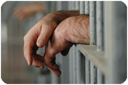 hands-behind-bars.jpg